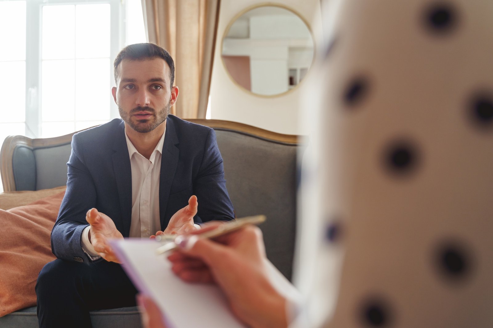 Gesticulating man telling about his psychological problems